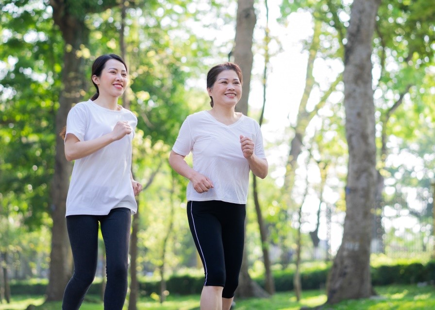 mother and daughter running