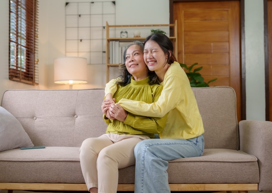 daughter hugging mother