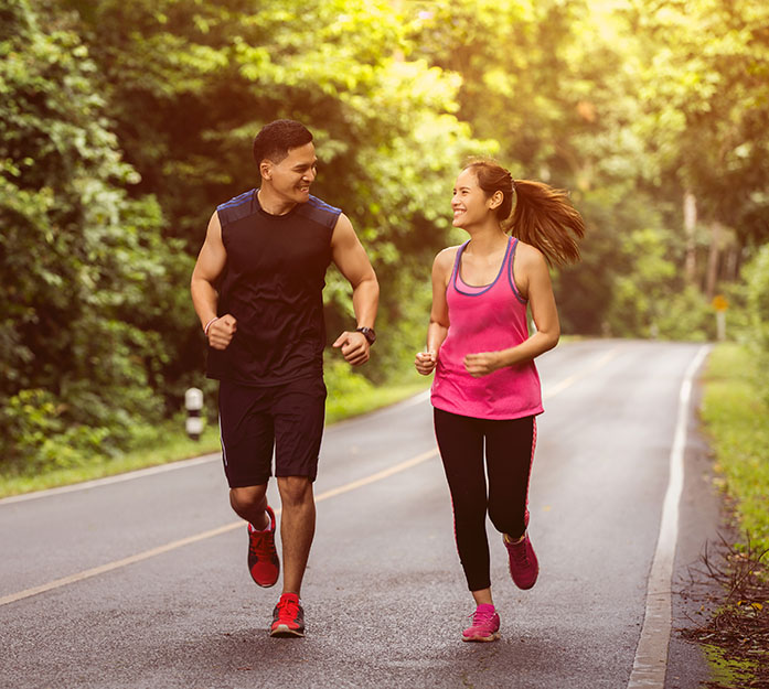 young couple running
