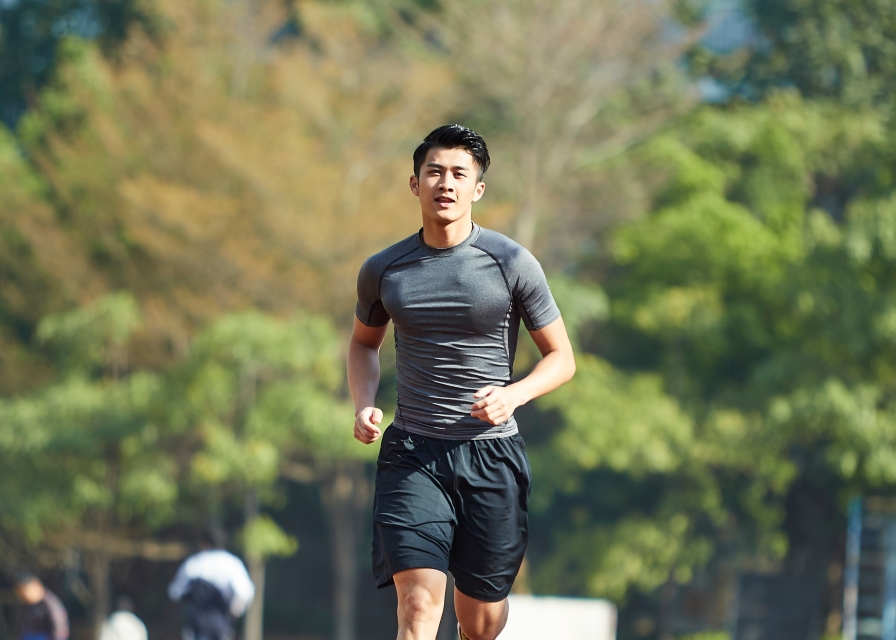 young man running
